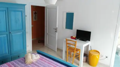 TV o dispositivi per l'intrattenimento presso B&b Sa Zodia Guest House