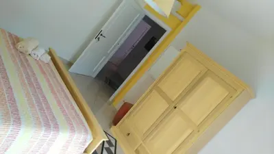 Letto o letti in una camera di B&b Sa Zodia Guest House