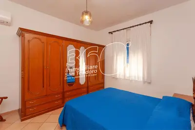 Letto o letti in una camera di Tirreno Bilo 3