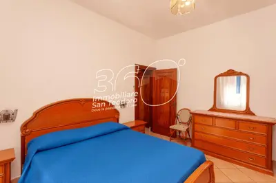 Letto o letti in una camera di Tirreno Bilo 3