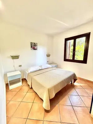 Letto o letti in una camera di Villino del Porto