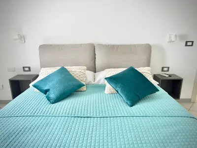 Letto o letti in una camera di bbolbia - bed and breakfast