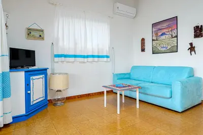 TV o dispositivi per l'intrattenimento presso Marineledda appartamento Il gelsomino