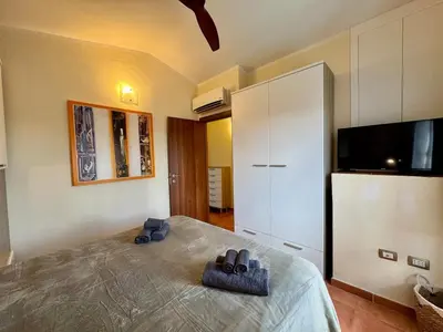 Letto o letti in una camera di Villa Daly