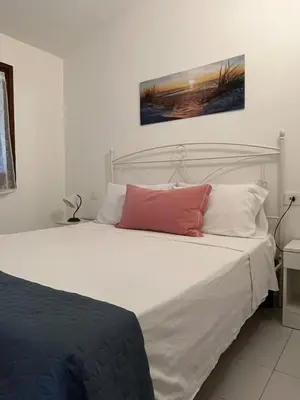 Letto o letti in una camera di San Teodoro Beach Villa 86b