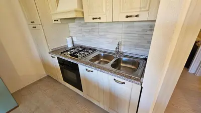 Cucina o angolo cottura di San Teodoro Beach Villa 86b