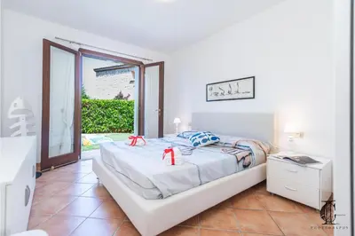 Letto o letti in una camera di Il Borgo 20 D4 700m From The Beach - Happy Rentals