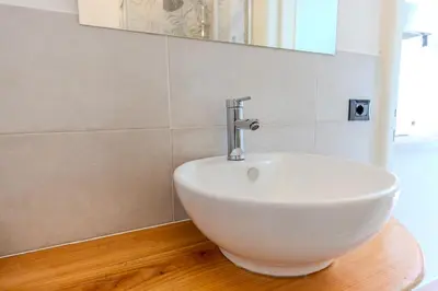 Bagno di Splendido Monolocale con Giardino Olbia