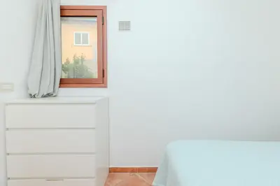 Letto o letti in una camera di Strepitoso Bilocale Via Mosca Olbia