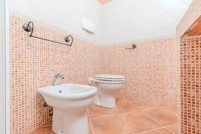 Bagno di Strepitoso Bilocale Via Mosca Olbia