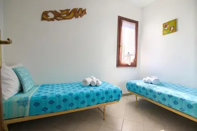 Letto o letti in una camera di 5 minutes to the sea - Villetta Mediterranea