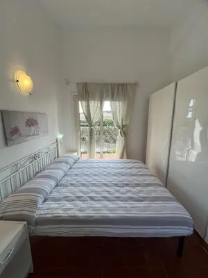 Letto o letti in una camera di Vermentino - Apartment - 200m from the Beach - Garden - Wi-Fi - AC - BBQ - Parking - Pet Friendly