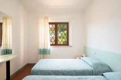Letto o letti in una camera di Casa Nivy