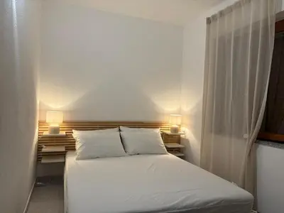 Letto o letti in una camera di Alga House