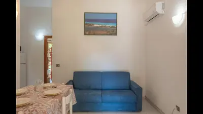 Area soggiorno di Outstanding Residenze Gallura 2Bedrm sleep 6 plus possible additional Child bed