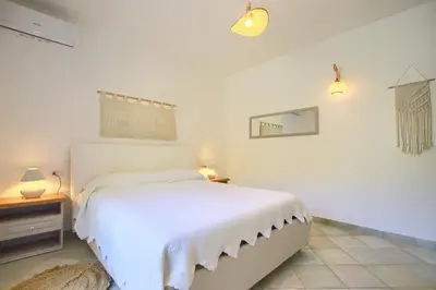 Letto o letti in una camera di La Dolce Casa - 5 minutes to the sea