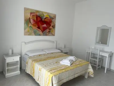 Letto o letti in una camera di Casa di Silvia