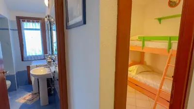 Letto o letti in una camera di Casa Tombolini