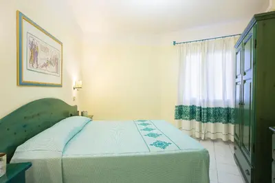 Letto o letti in una camera di Alba Dorata Resort