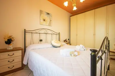 Letto o letti in una camera di La Caletta 3