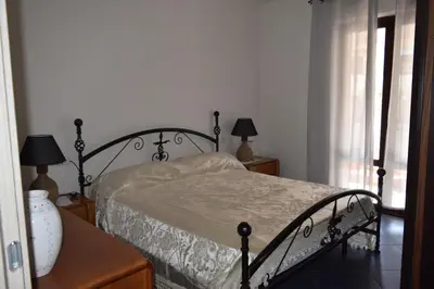 Letto o letti in una camera di Villa Rita Porto Ottiolu