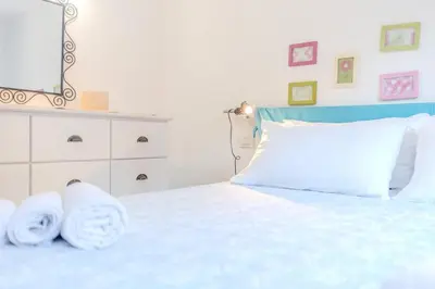 Letto o letti in una camera di oasi sul mare - a due passi dalle spiaggie
