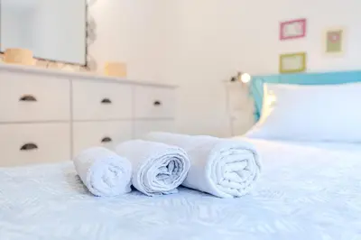 Letto o letti in una camera di oasi sul mare - a due passi dalle spiaggie