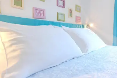 Letto o letti in una camera di oasi sul mare - a due passi dalle spiaggie