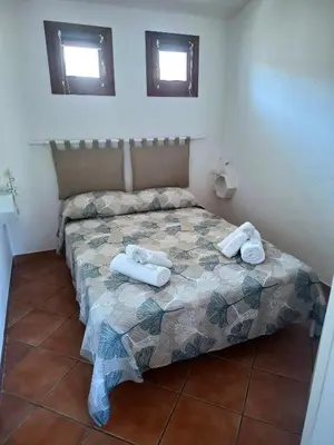Letto o letti in una camera di Casa Alma