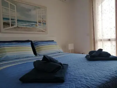 Letto o letti in una camera di Moys apartment sea view olbia