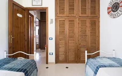 Letto o letti in una camera di 'La Casa Di Delia'