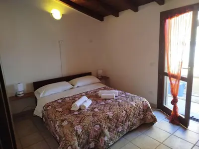 Letto o letti in una camera di Cimarosa Panoramico 5