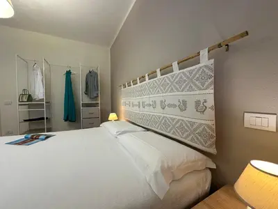 Letto o letti in una camera di NG Collection I Graniti