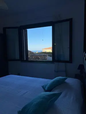Letto o letti in una camera di Casa vacanze Budoni - Agrustos - San Teodoro
