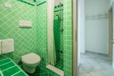 Bagno di GuestHost - Seaview Villa with Veranda GolfoAranci