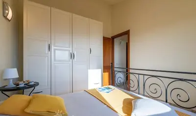 Letto o letti in una camera di Ampio Appartamento In Centro