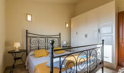 Letto o letti in una camera di Ampio Appartamento In Centro