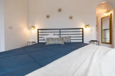 Letto o letti in una camera di Milla E Willy Guest House