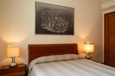 Letto o letti in una camera di Casa Marina con Patio by Wonderful Italy