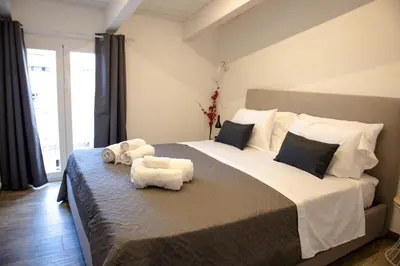 Letto o letti in una camera di La Corte di Giovanni - Guest House