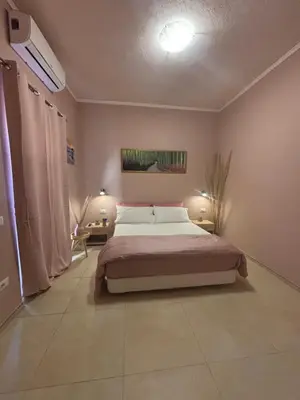 Letto o letti in una camera di Casa relax home