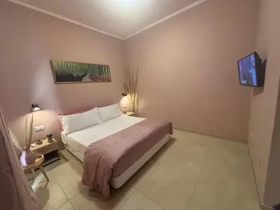 Letto o letti in una camera di Casa relax home