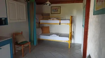 Letto o letti in una camera di Domos De Badas