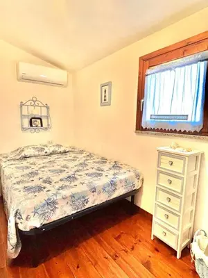 Letto o letti in una camera di Villino Il Canneto