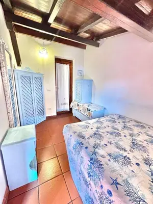 Letto o letti in una camera di Villino Il Canneto