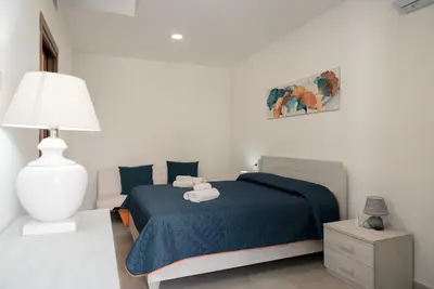 Letto o letti in una camera di Casa dei nonni