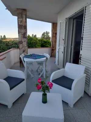 Area soggiorno di Marelìa holiday apartment in La Caletta