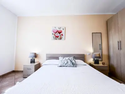 Letto o letti in una camera di Ginestra house