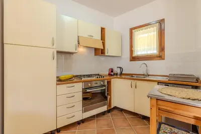 Cucina o angolo cottura di Splendido appartamento vista mare San Teodoro