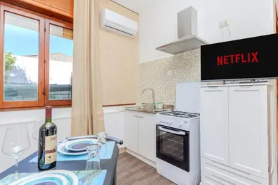 Cucina o angolo cottura di Solskin Apartment - A due passi dal Lungomare -
